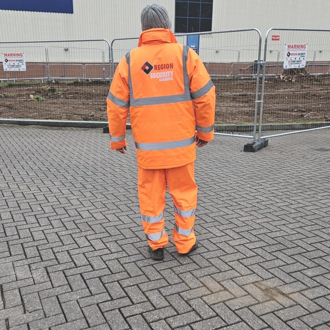 A Loughborough construction manned guarding officer conducting a security inspection around a building site