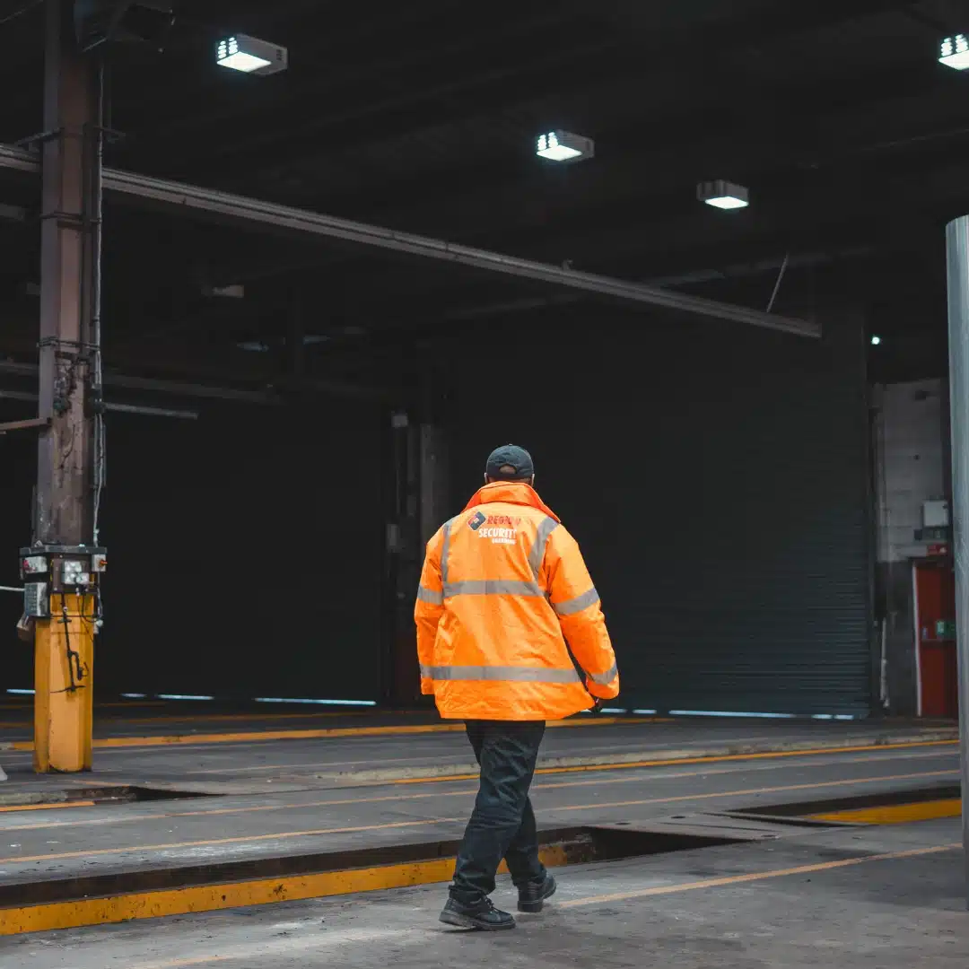 A guard on patrol round a industrial site for Castle Donington security services