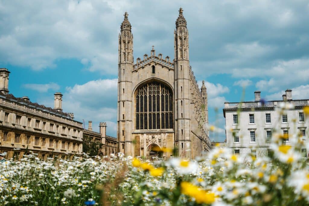 The University of Cambridge taken from a low angle covering the skies and the flowers!