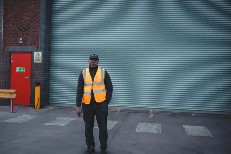 Newcastle security guard securing warehouse access point