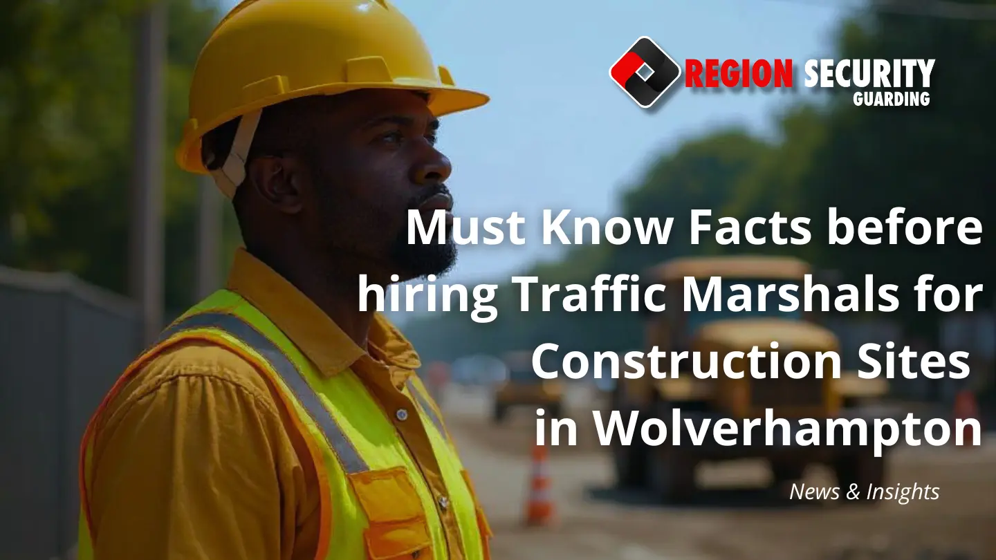 A traffic marshall in Wolverhampton inspecting the construction site safety and pedestration movements to ensure the safety and security of the construction site and public