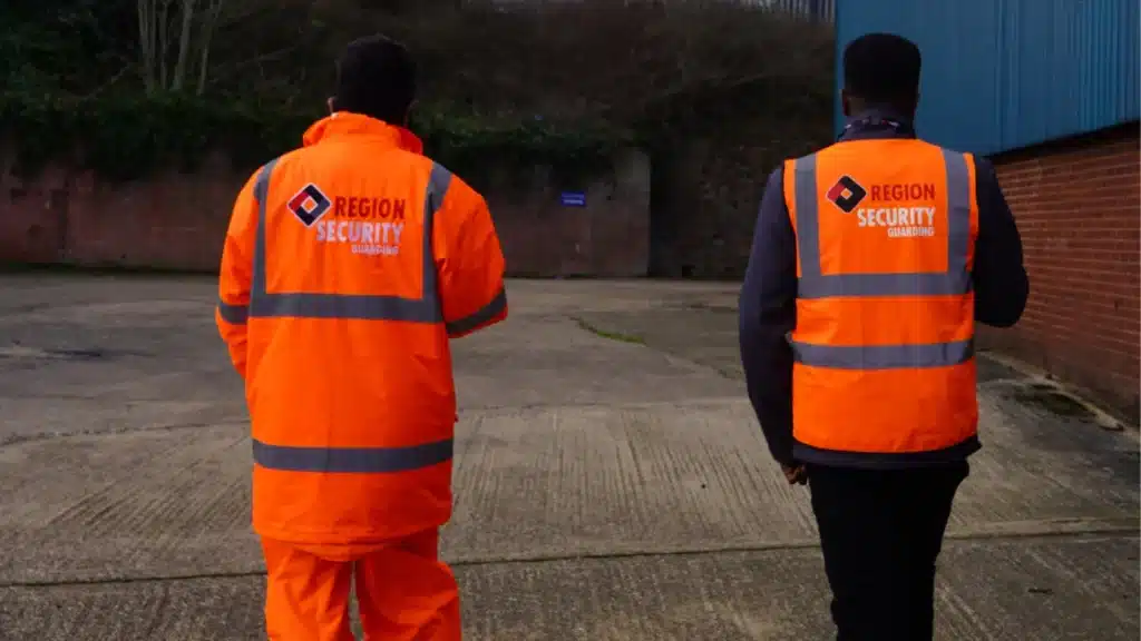 Two of our team demonstrating teamwork as one of their key security guard skills