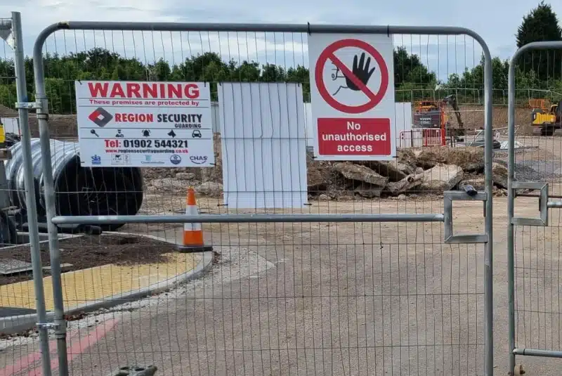 a Region Security Guarding sign telling people we're providing construction security Mansfield to the site