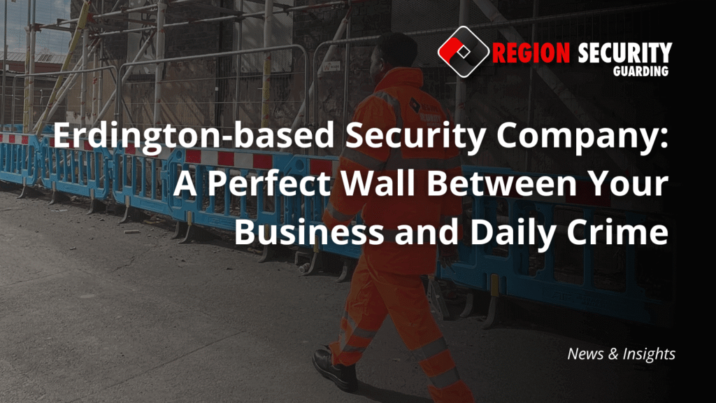 A security guard from our Erdington-based security company is seen walking past blue construction barriers