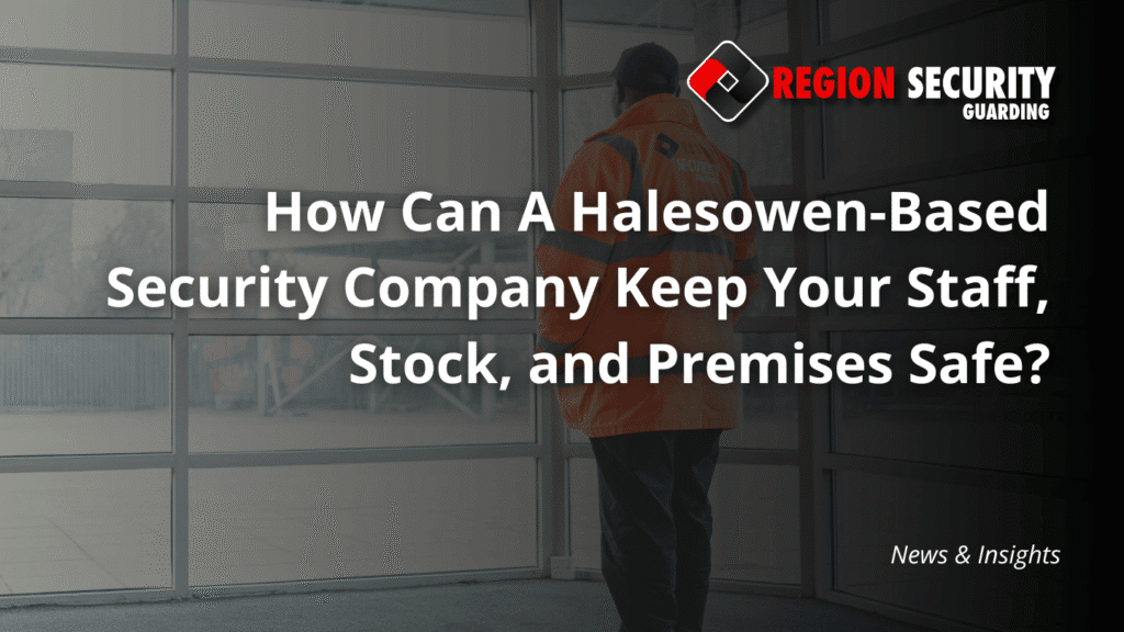 A security guard, part of a Halesowen-based security company, is shown in a high-visibility jacket, monitoring a building from an indoor vantage point.