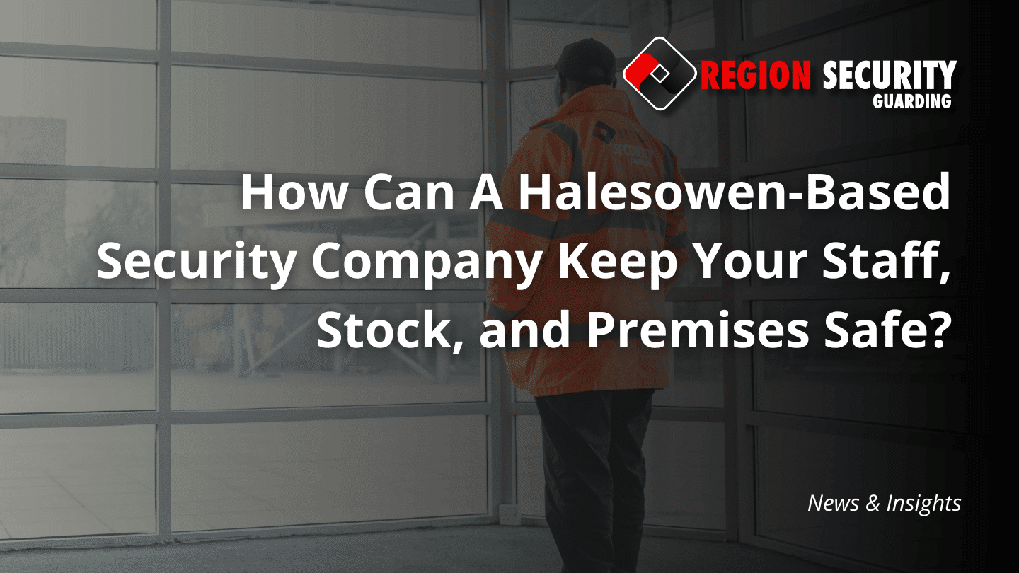 A security guard, part of a Halesowen-based security company, is shown in a high-visibility jacket, monitoring a building from an indoor vantage point.