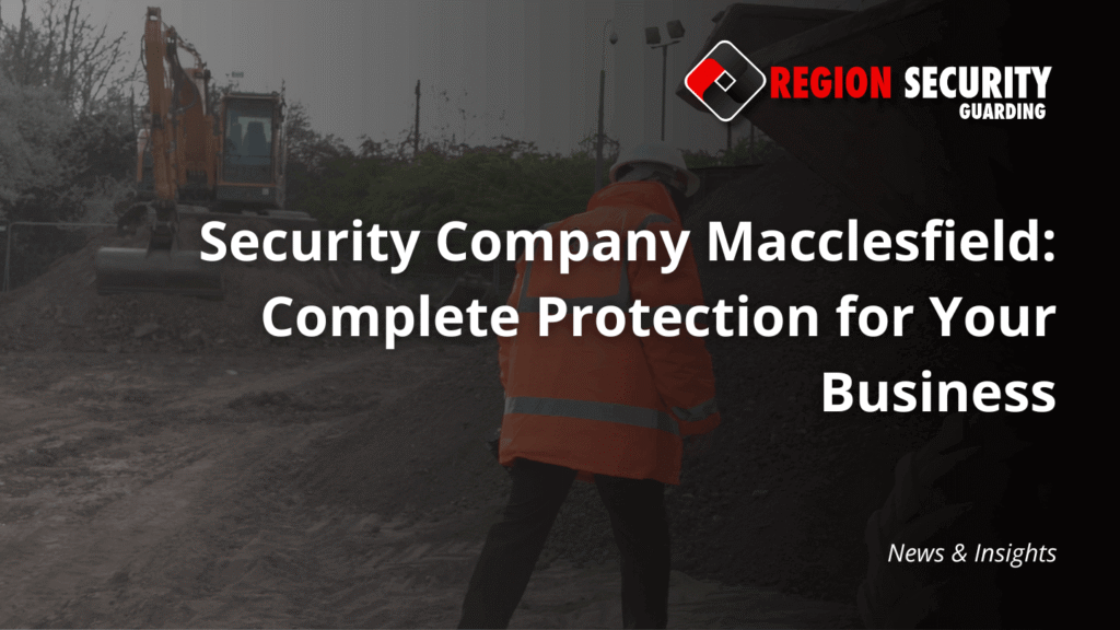 A security officer from a security company Macclesfield stands on a construction site with a large digger in the background.