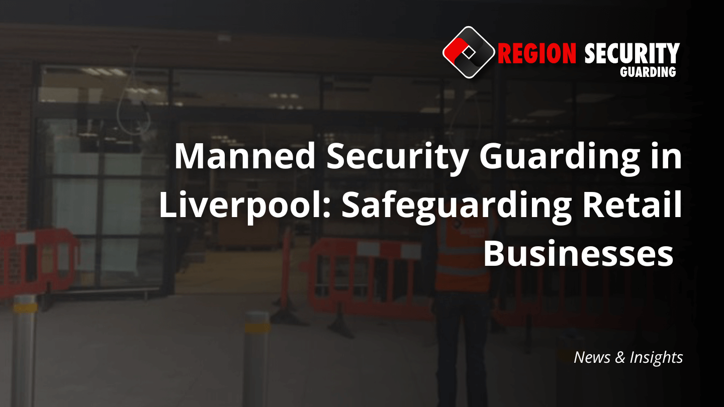 A professional security guard in a high-visibility vest stands in front of a retail entrance with orange barriers, representing manned security guarding in Liverpool.