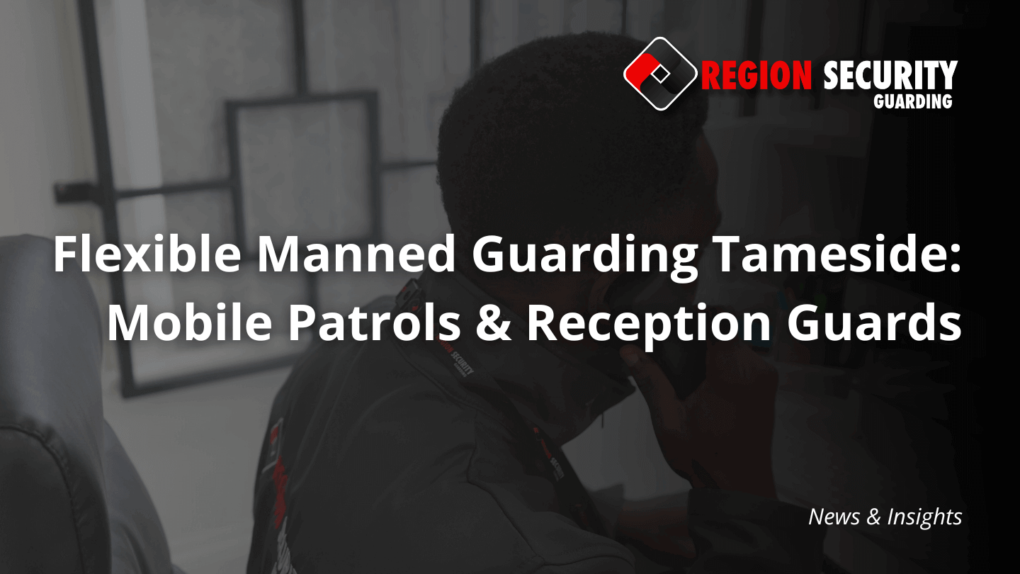 A security guard is on a phone call in a reception area, demonstrating flexible manned guarding Tameside services.