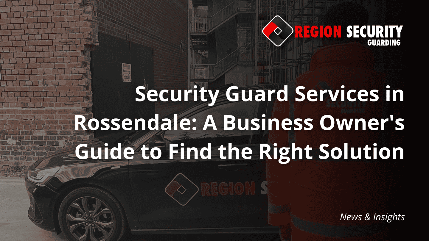 A security guard standing next to a branded patrol car in an urban setting, representing security guard services Rossendale.