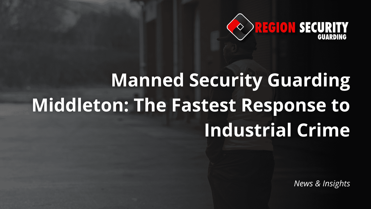 A security guard standing watch over an industrial area at dusk, representing manned security guarding Middleton for industrial sites.