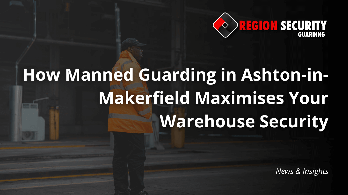 A security guard stands attentively outside a large warehouse, representing manned guarding in Ashton-in-Makerfield services.