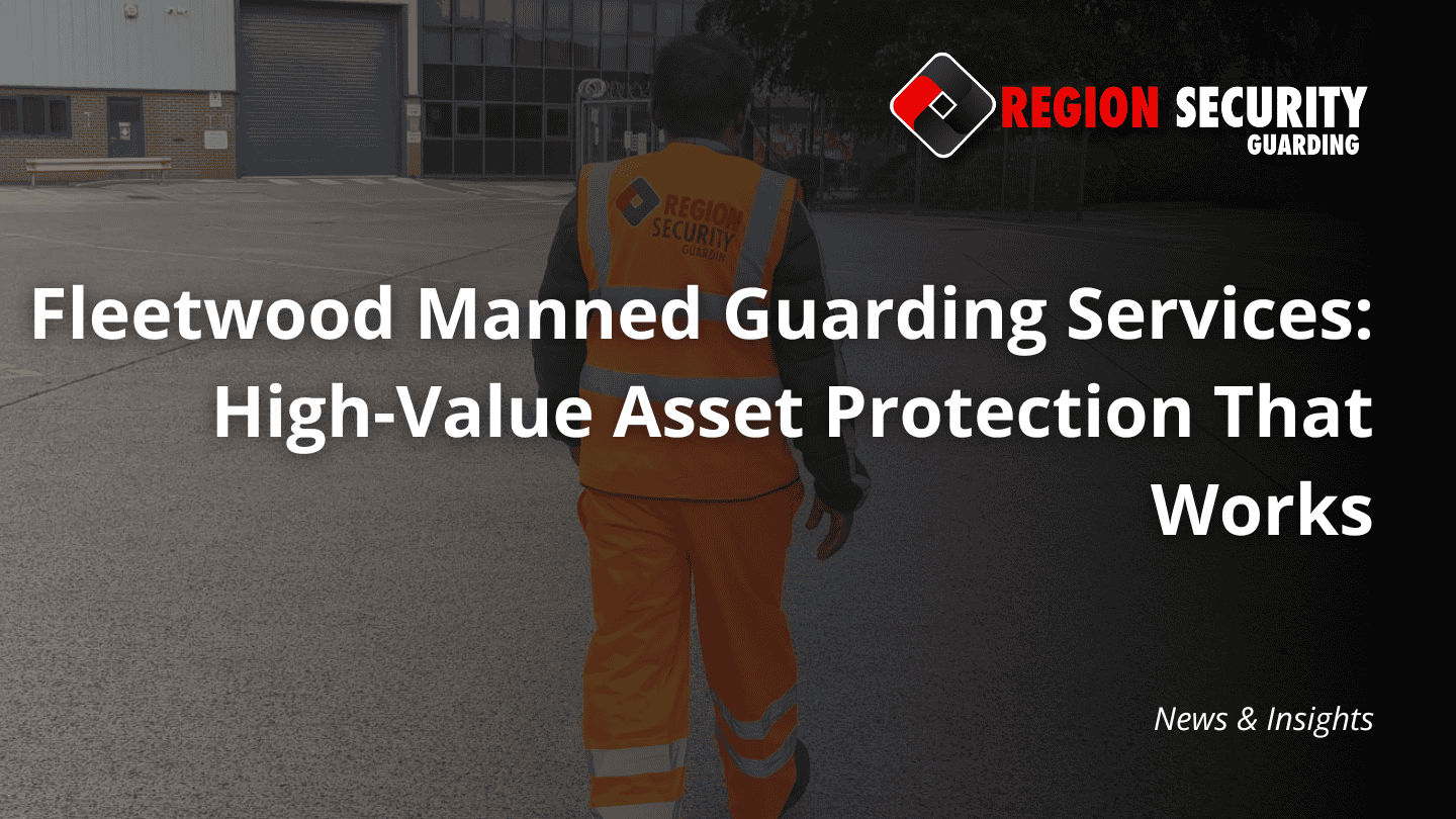 A security guard wearing an orange hi-vis vest, showing Fleetwood manned guarding services, walks towards a facility.