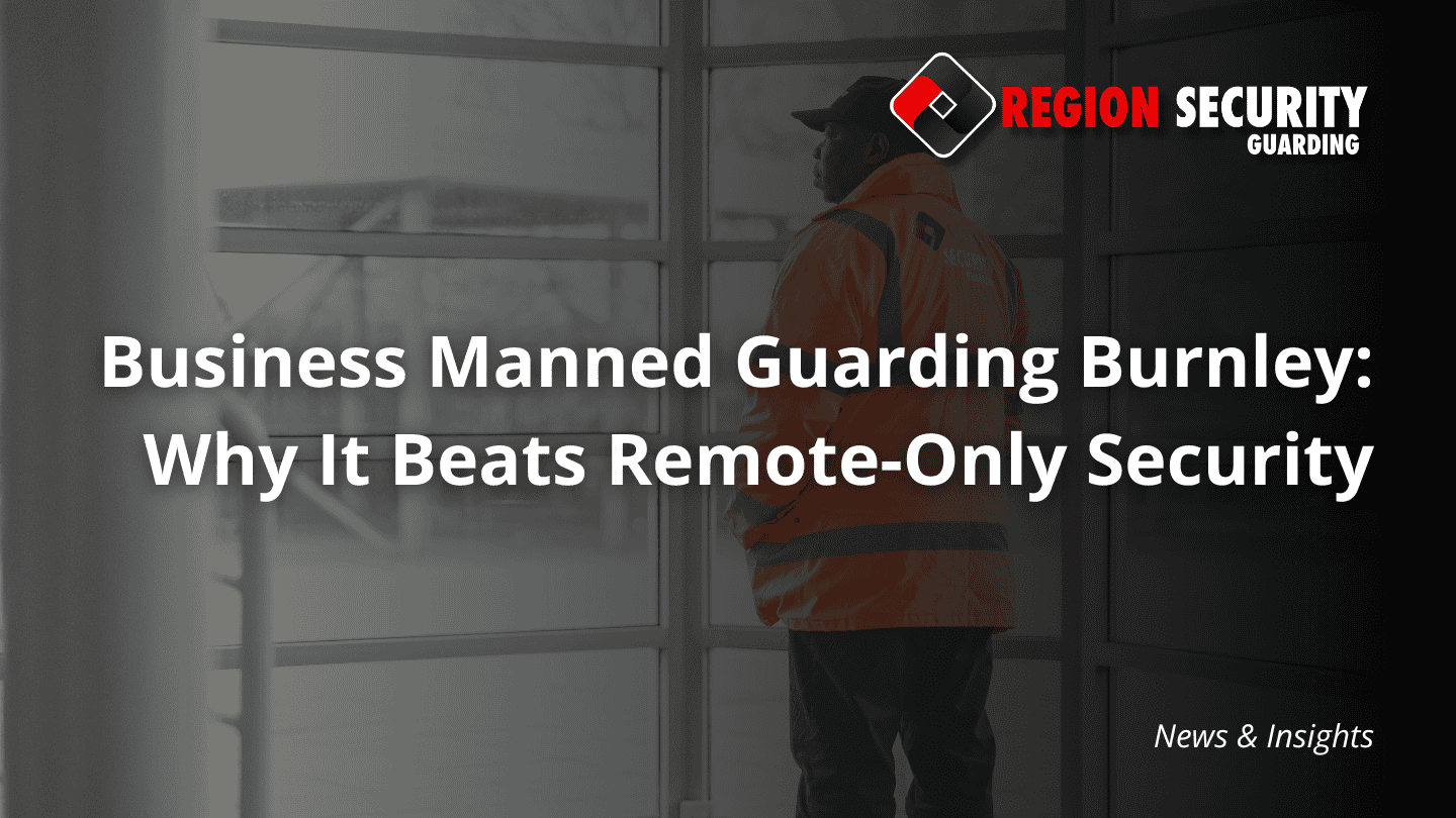 An image promoting business manned guarding Burnley, showing a professional guard patrolling an interior entrance of a commercial site.
