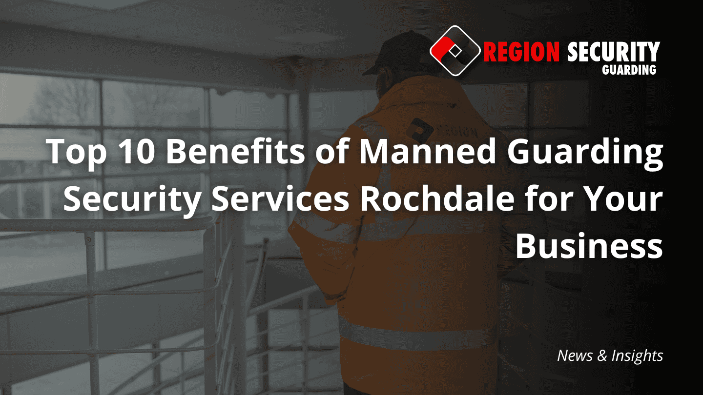 View from behind of a security guard on patrol inside a building, illustrating the benefits of manned guarding security services Rochdale.
