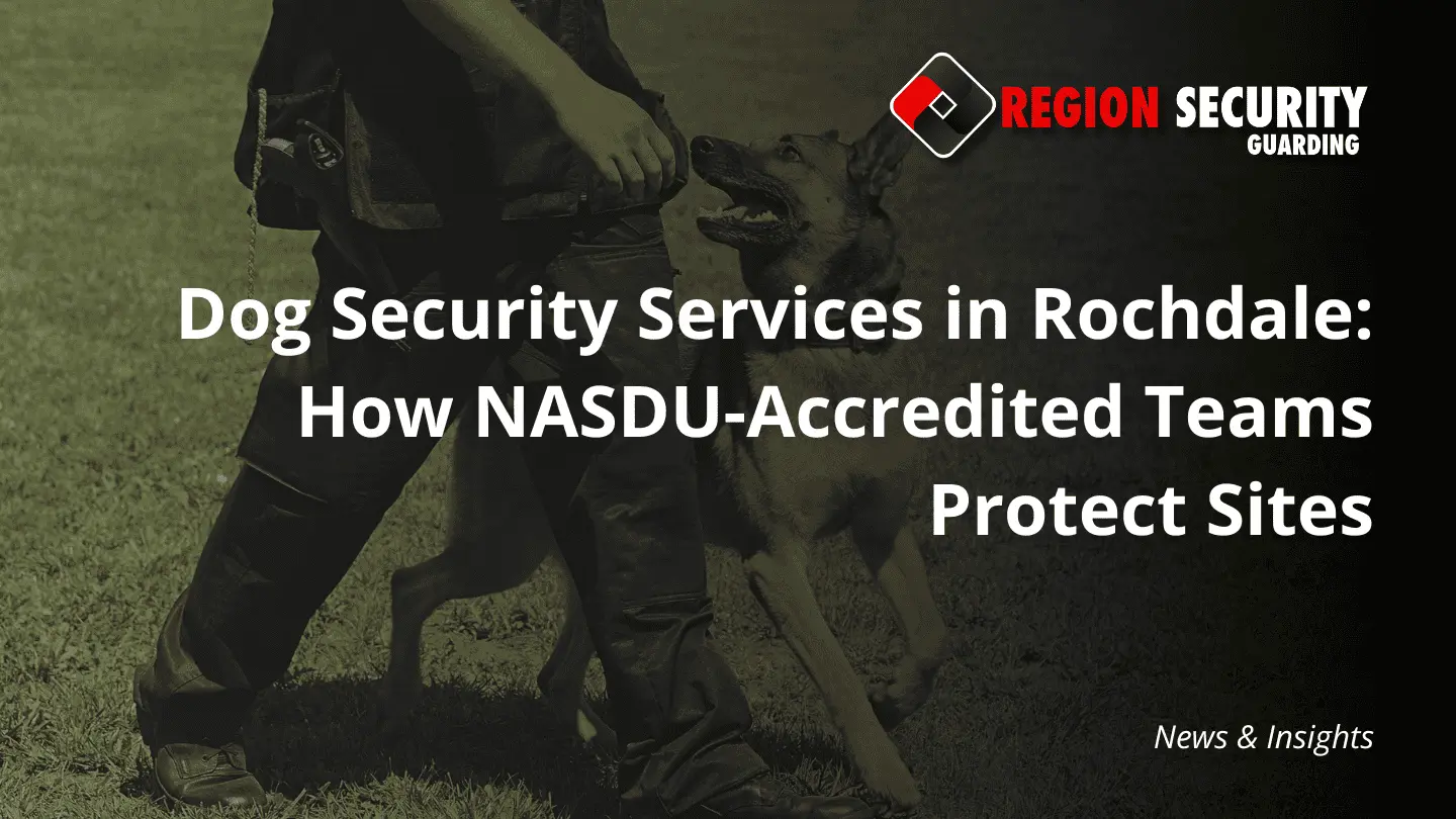 A professional security dog handler and their guard dog, training on grass, representing dog security services in Rochdale.