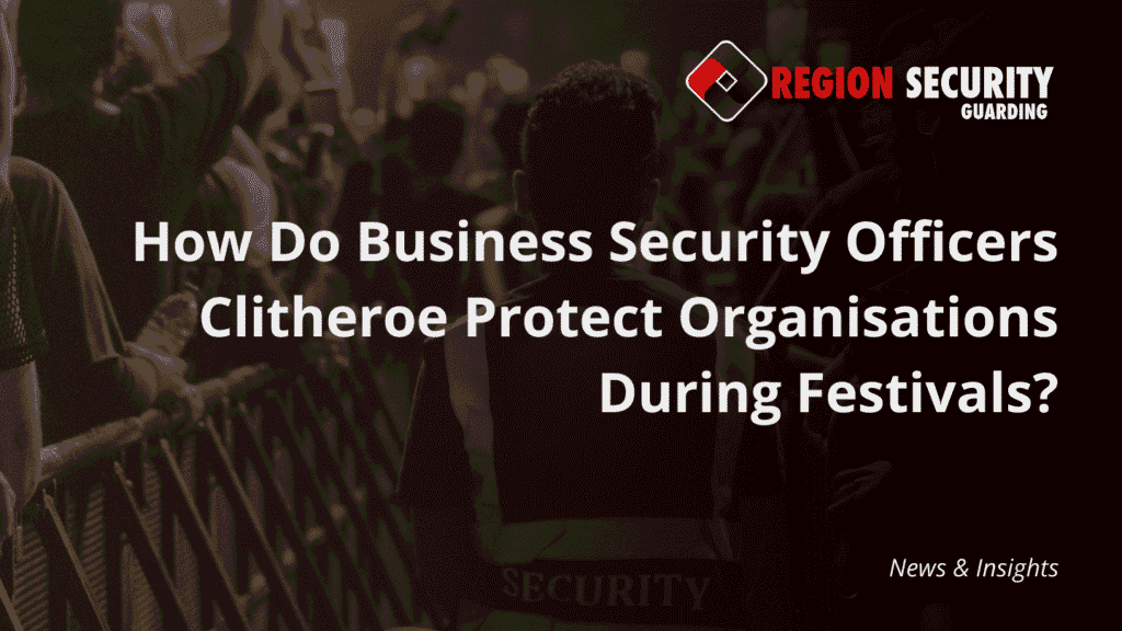 A security officer standing near a crowd barrier at a large event or festival, representing business security officers Clitheroe.