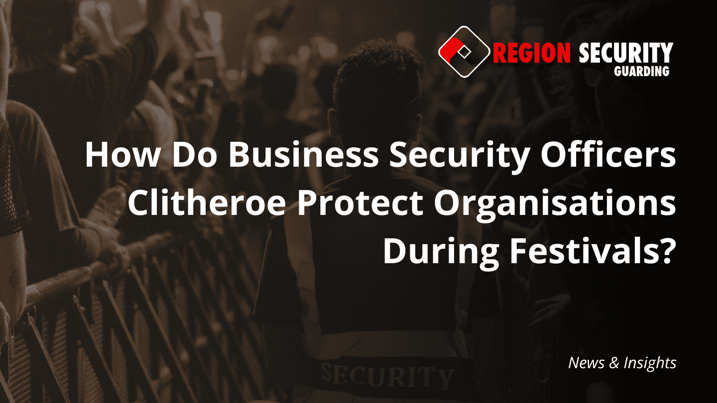 A security officer standing near a crowd barrier at a large event or festival, representing business security officers Clitheroe.