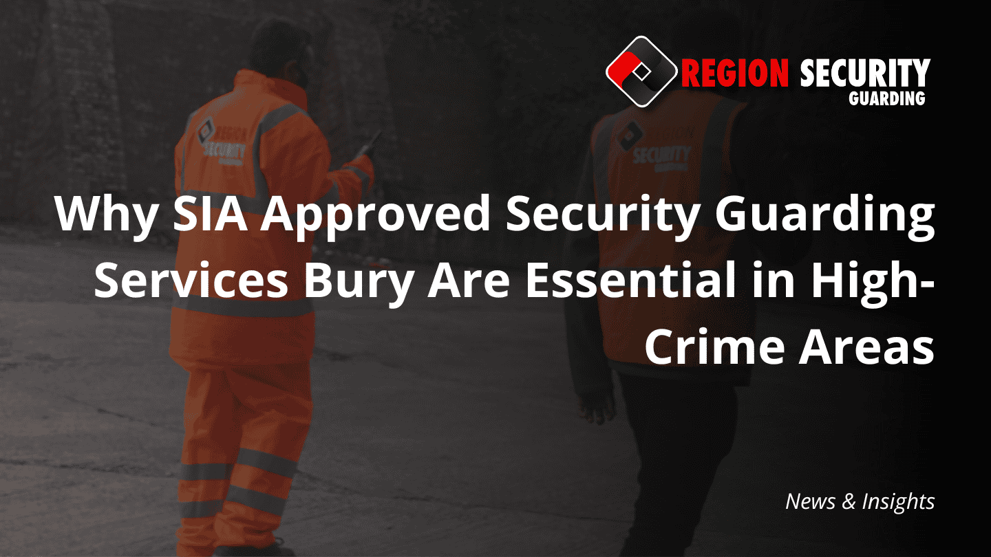 Two security guards in hi-vis uniforms stand together on patrol, representing professional security guarding services Bury.