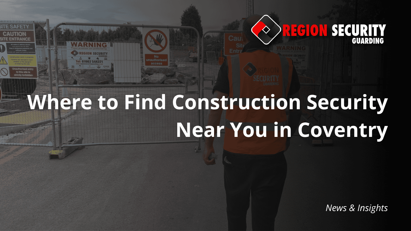 The back of a trained construction security guard near Coventry is visible, standing in front of the fenced entrance of a site with caution signs.