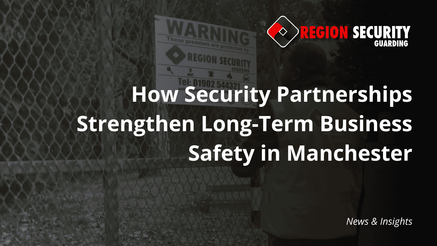 A security officer stands guard at a chain-link fence with a warning sign, emphasising the need for long term business safety Manchester.