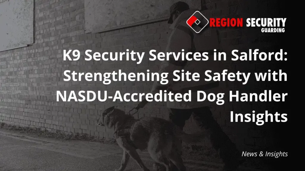 A security professional walks a trained dog along a sidewalk next to a brick building, highlighting K9 security services in Salford.