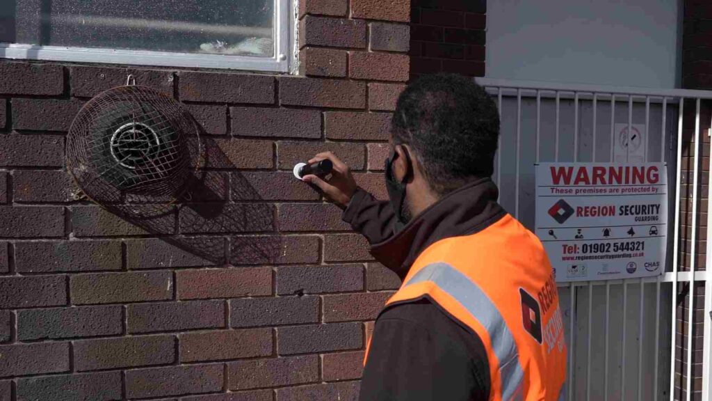 Factory security professional guards monitoring premises, equipment, and staff safety effectively.