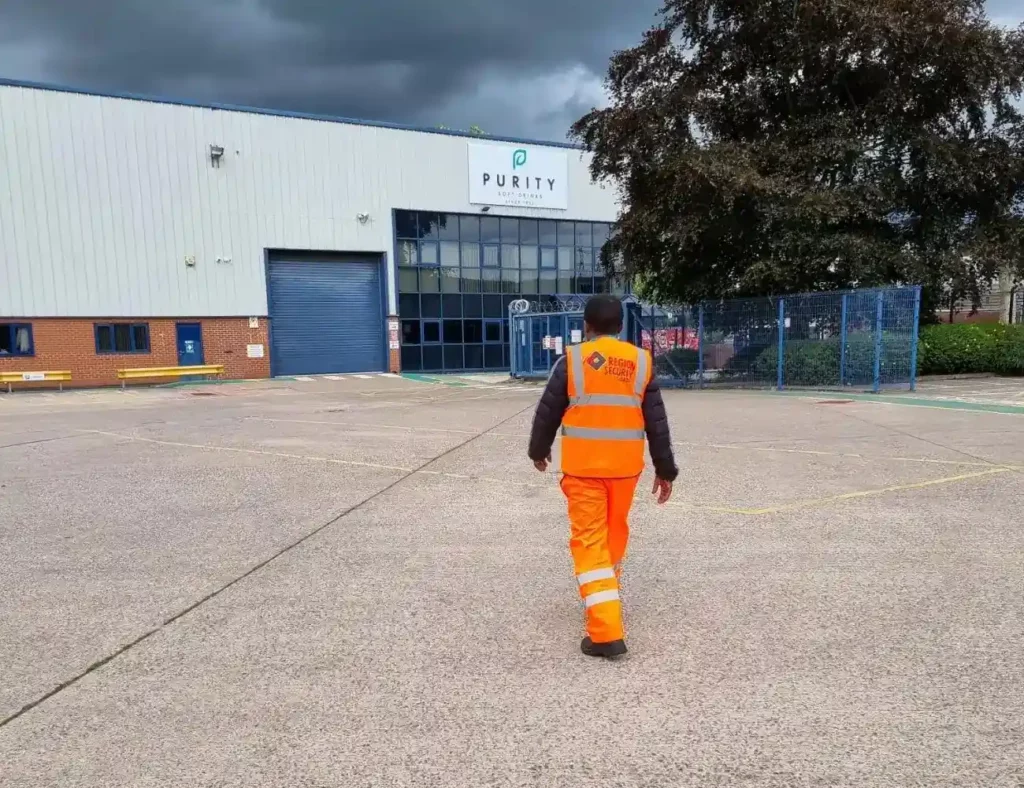 K9 security patrol dog and handler protecting industrial site in Cardiff