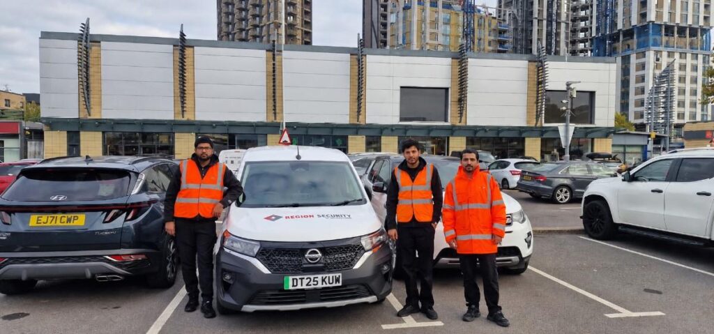 Security guards standing in front of their mobile response vehicle showcasing the excellent service provided by Region Security Guarding